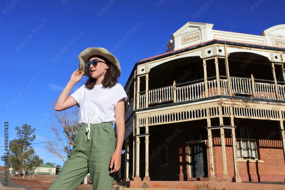 Young Australian girl  visiting at Gwalia gold mine ghost town in Western Australia