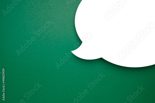 Blank white speech bubble part over a green background