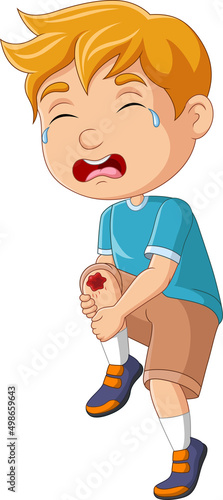 Cartoon little boy crying with scraped knee