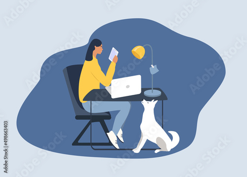 vector illustration in flat style. A young woman works at home at a laptop, a dog sits next to her