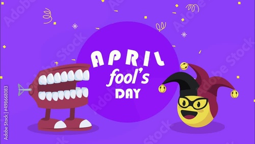 april fools day lettering with crazy mouth and joker hat photo
