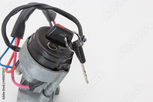 Foto Old car ignition lock on a white background.