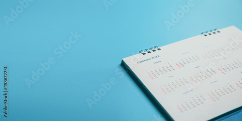 Close top view on white calendar 2022 month schedule Work planning and life concept.