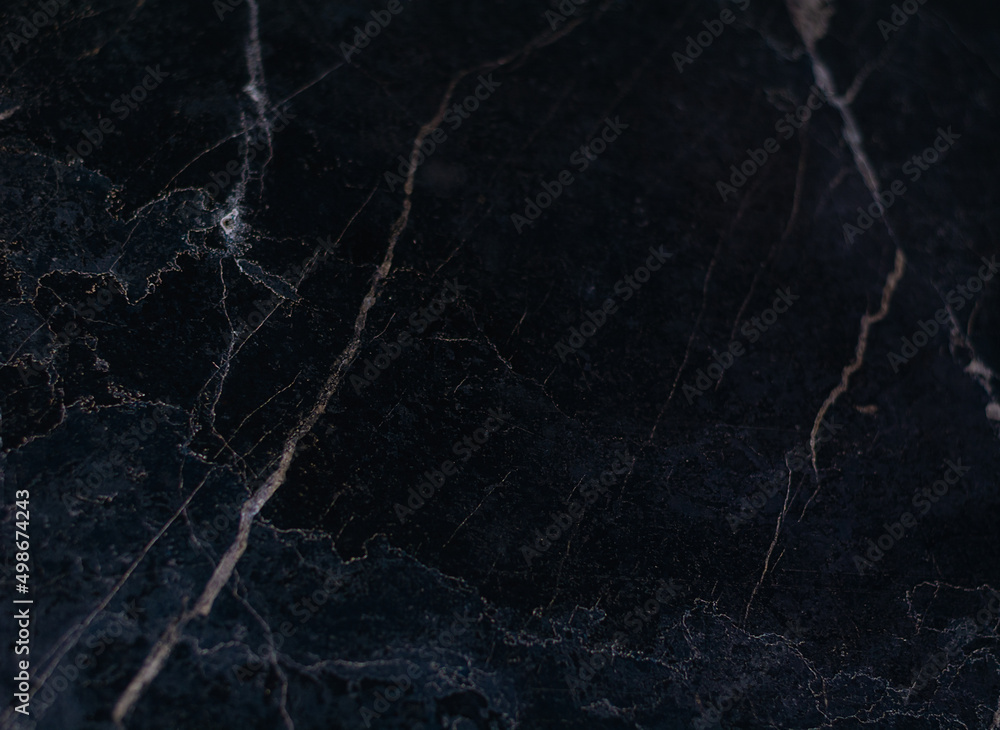Gray marble background with light veins. Focus on the left and center parts. Horizontal view. Gray marble background with light veins. Focus on the left and center parts. Horizontal view.