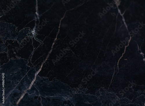 Gray marble background with light veins. Focus on the left and center parts. Horizontal view. © Аглона Носовская