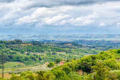 Fototapeta Naklejka Na Ścianę i Meble -  Tuscan countryside landscape with rain clouds