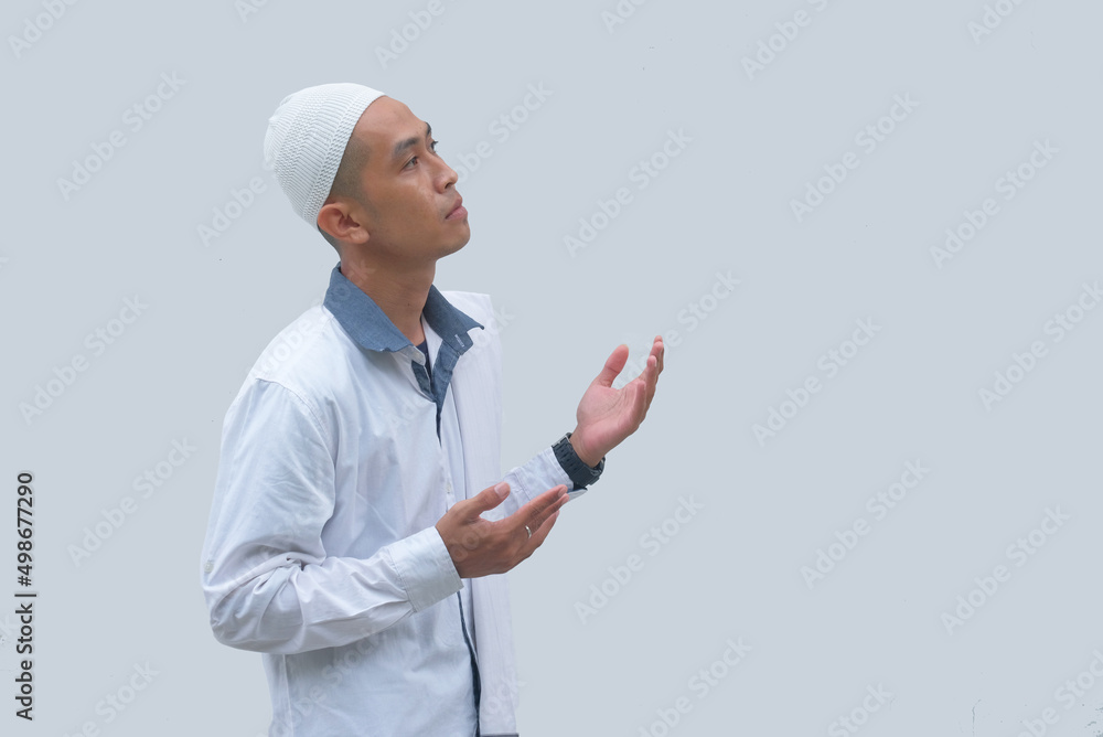 side view of man pray isolated in white