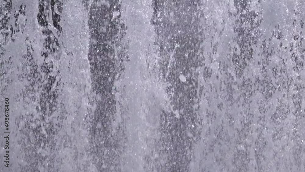 Closeup of water spurting from the fountain. Water jet splashing. 4K Closeup of water spurting from the fountain. Water jet splashing. 4K