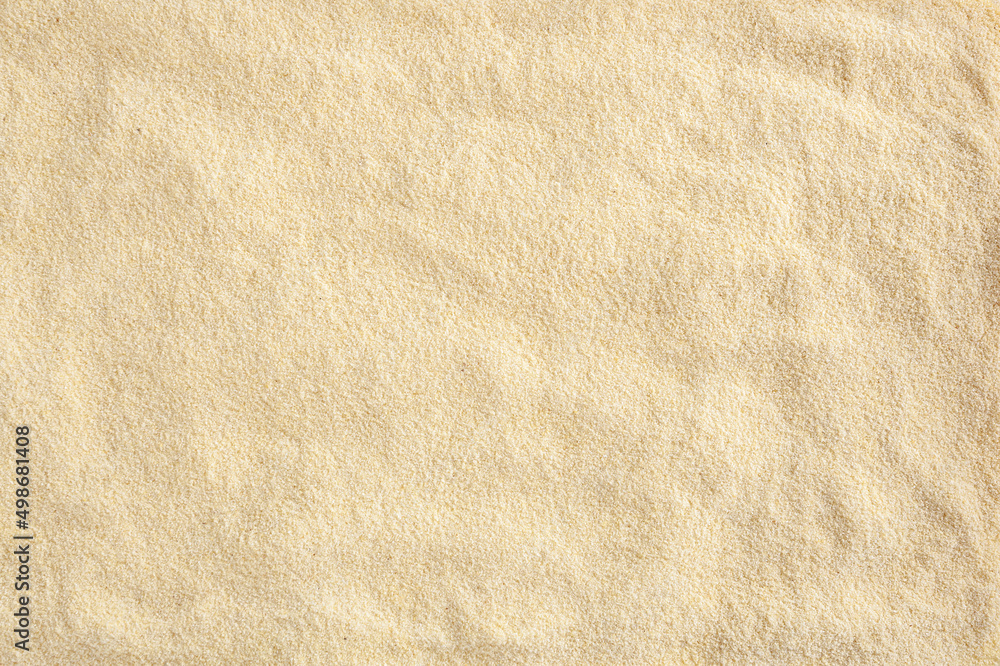 Uncooked semolina flour background