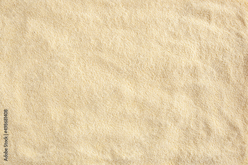 Obraz na płótnie Uncooked semolina flour background w salonie