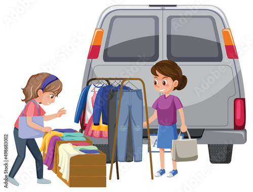 Girls shopping clothes at yard sale