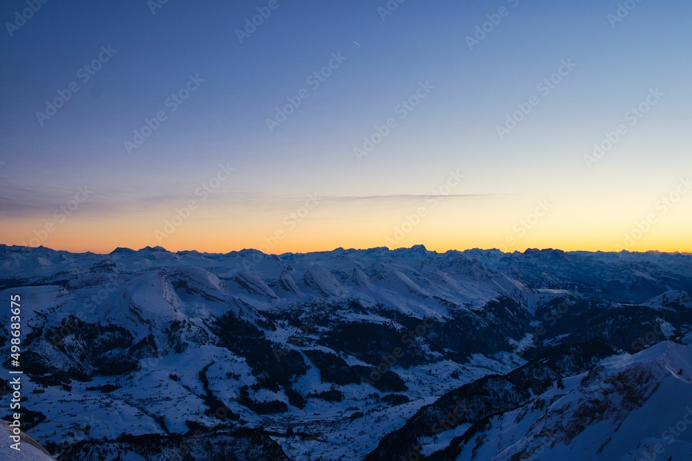 Santis peak mountain Switzerland. spectacular view, sunset. winter snow covered mountains