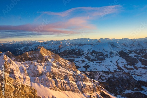 Säntis peak mountain Switzerland. spectacular view, sunset. winter snow covered mountains. clear Sunset Santis peak mountain Switzerland. spectacular view, sunset.