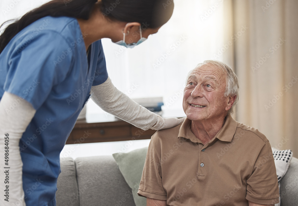 Im here for anything you need. Shot of a young female nurse having a checkup with an elderly patient at home. Im here for anything you need. Shot of a young female nurse having a checkup with an elderly patient at home.