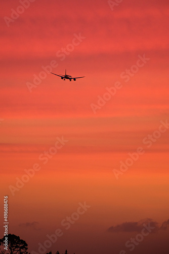 Airplane in the sunset © Ken