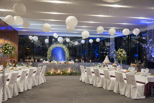 wedding in a restaurant decorated with floristry