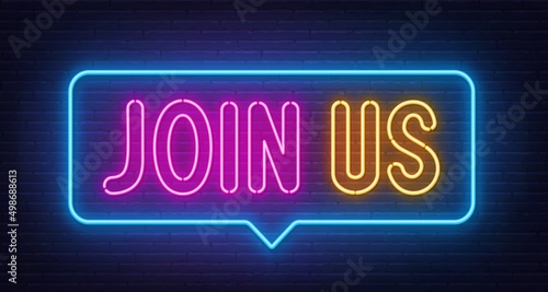 Join Us neon sign in the speech bubble on brick wall background.