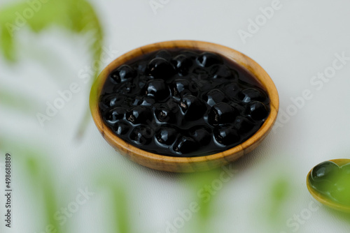 Boba drink with a plain background. This drink can be used as takjil during Ramadan. photo