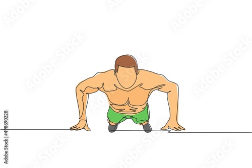 Single continuous line drawing of young sportive man training push up in sport gymnasium club center, front view. Fitness stretching concept. Trendy one line draw graphic design vector illustration photo