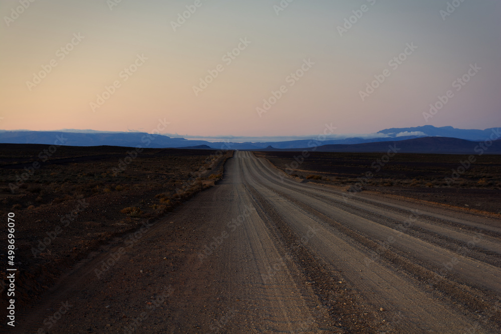 Fototapeta premium Sunrise dirt road in Tankwa Karoo National Park