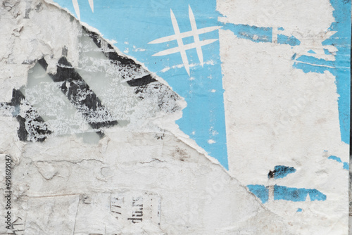 Hashtag sign on a ripped street poster background
