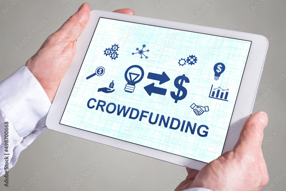 Crowdfunding concept on a tablet Crowdfunding concept on a tablet