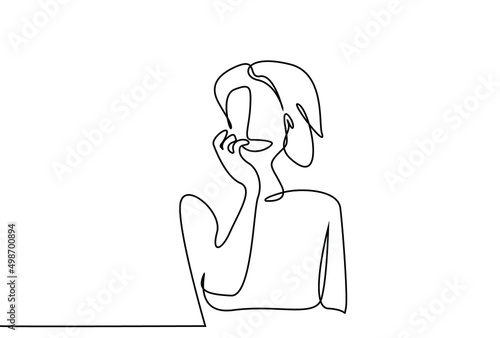 a woman bites her nails from stress and boredom and tension. Psychologically ill woman biting nails in moments of shock