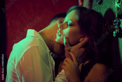 Fotografi in arms of passionate lover