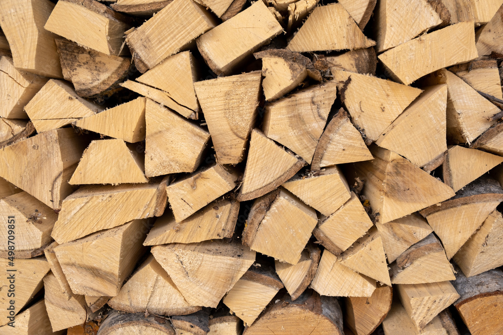 Stacked chopped fire wood texture background Stacked chopped fire wood texture background