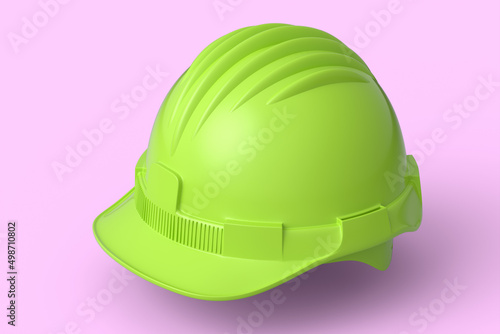 Yellow safety helmet or hard cap isolated on pink monochrome background