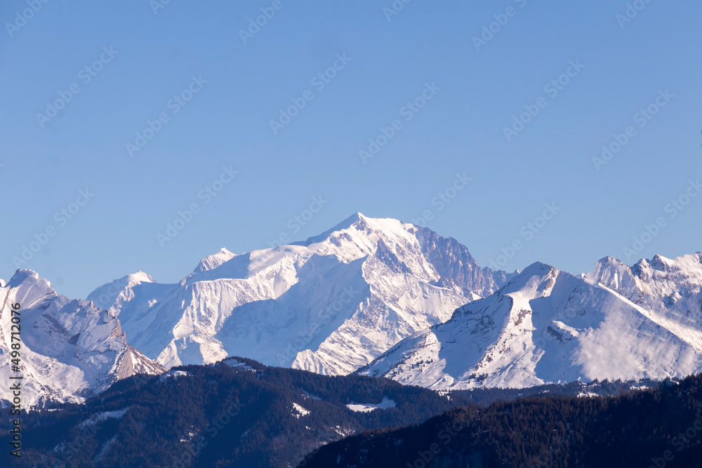 Summit of Mont Blanc mountain in the Alps, popular for outdoor activities: hiking, climbing, trail running and winter sports