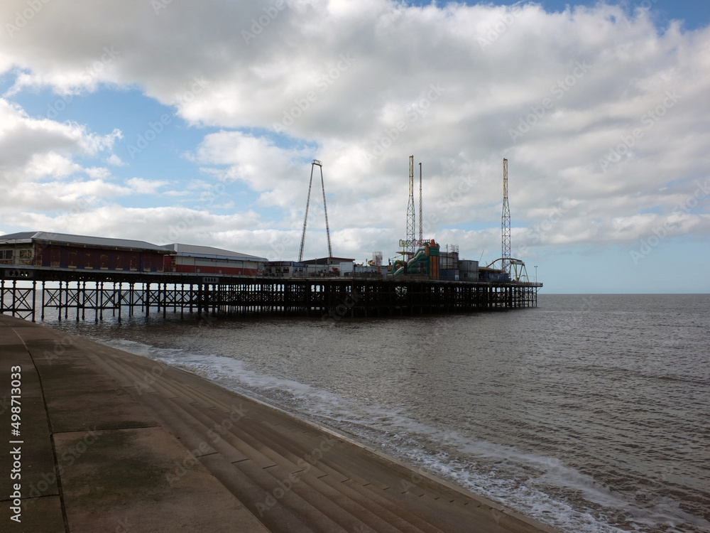 view of Blackpool south pier and funfair from the seawall