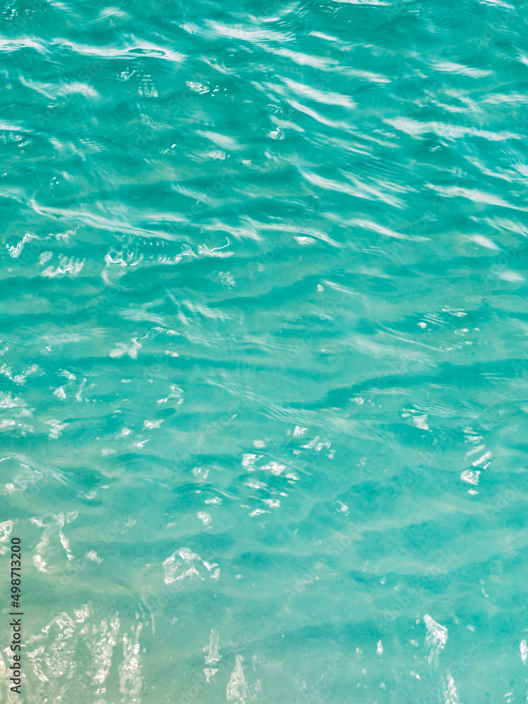 Surface transparent blue sea water. Surface transparent blue sea water.