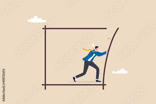 Pushing limits challenge yourself to overcome boundary, effort and strength to push over limit, attitude to success, get out of comfort zone for freedom, businessman pushing to break boundary box.