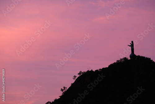 Violet sunset sky on Cristo Rei Dili, Timor Leste.