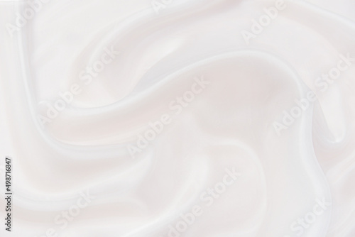 Abstract and soft focus wave of white or ivory fabric background, white ivory texture and detail