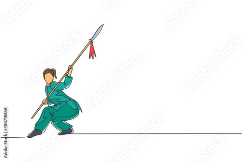 Single continuous line drawing of young woman wushu fighter, kung fu master in uniform training with spear at dojo center. Fighting contest concept. Trendy one line draw design vector illustration