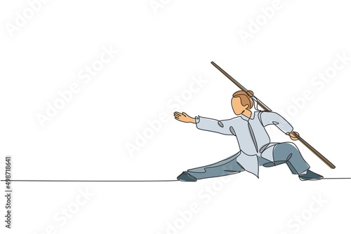 One continuous line drawing of young wushu master woman, kung fu warrior in kimono with long staff on training. Martial art sport contest concept. Dynamic single line draw design vector illustration