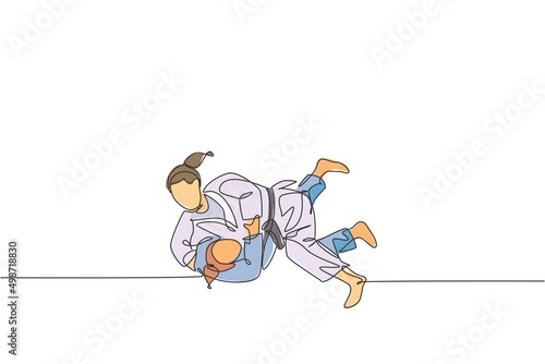 One single line drawing two young energetic judokas fighter women battle fighting at gym center graphic vector illustration. Martial art sport competition concept. Modern continuous line draw design