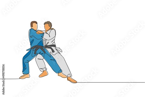 One continuous line drawing of two young sporty men training judo technique at sport hall. Jiu jitsu battle fight sport competition concept. Dynamic single line draw design graphic vector illustration