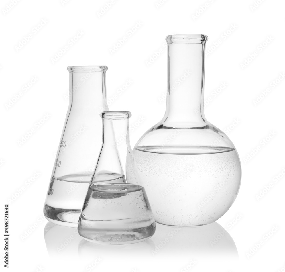 Flasks with transparent liquid on white background Flasks with transparent liquid on white background