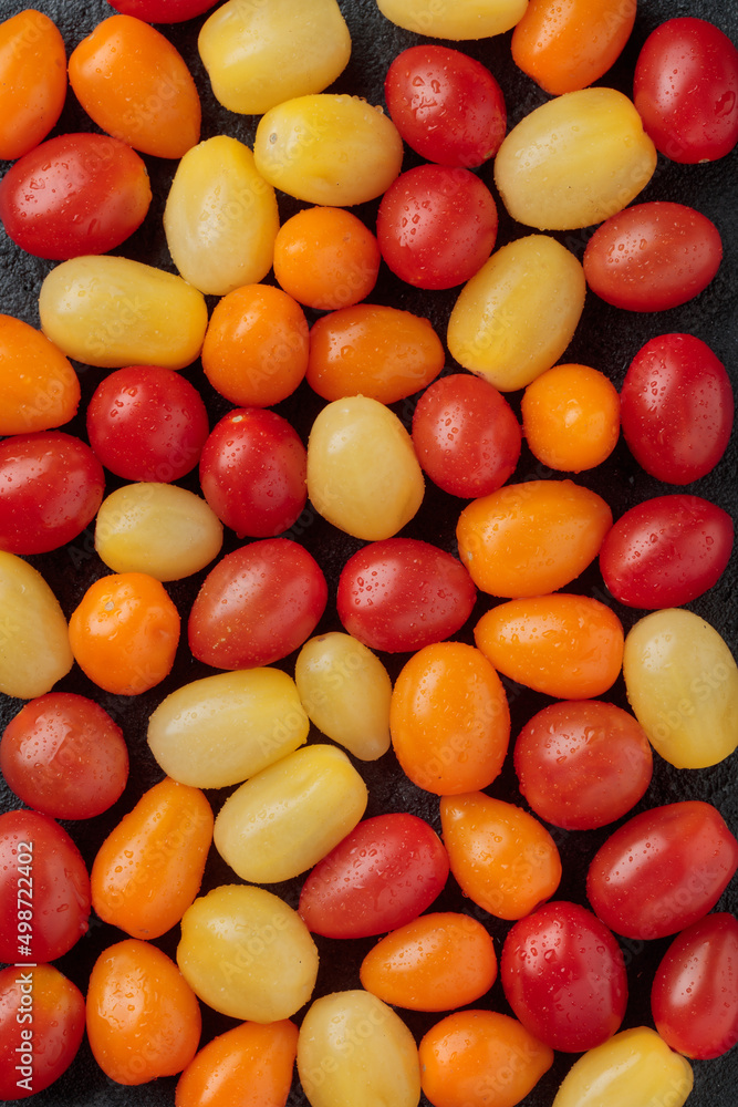 Colorful cherry tomatoes pattern top view Colorful cherry tomatoes pattern top view