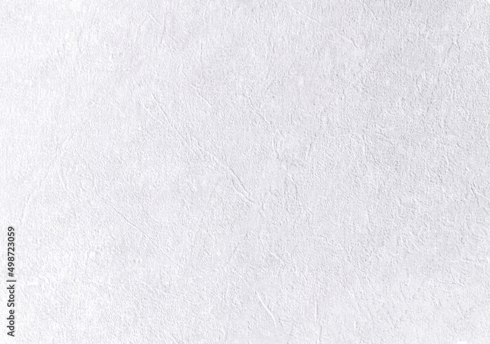 Light background of decorative plaster with abstract spots. Unusual texture of white or gray wall with beautiful patterns, creative surface background. Finishing coating for building cladding. Light background of decorative plaster with abstract spots. Unusual texture of white or gray wall with beautiful patterns, creative surface background. Finishing coating for building cladding.