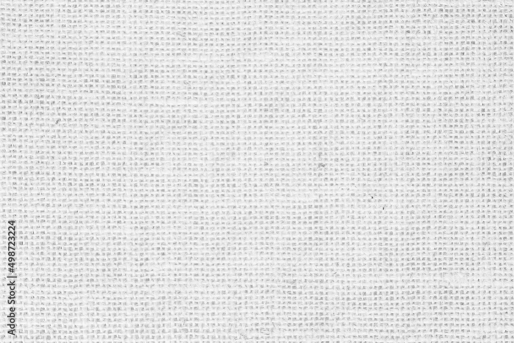 White fabric jute hessian sackcloth canvas woven gauze texture pattern in light white color blank decoration. White fabric jute hessian sackcloth canvas woven gauze texture pattern in light white color blank decoration.