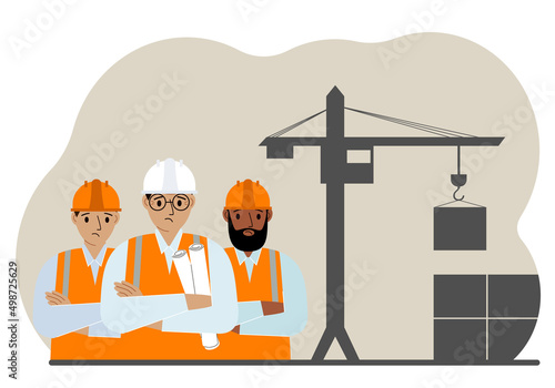 A team of engineers near a construction crane. A team of builders holding blueprints near construction equipment.