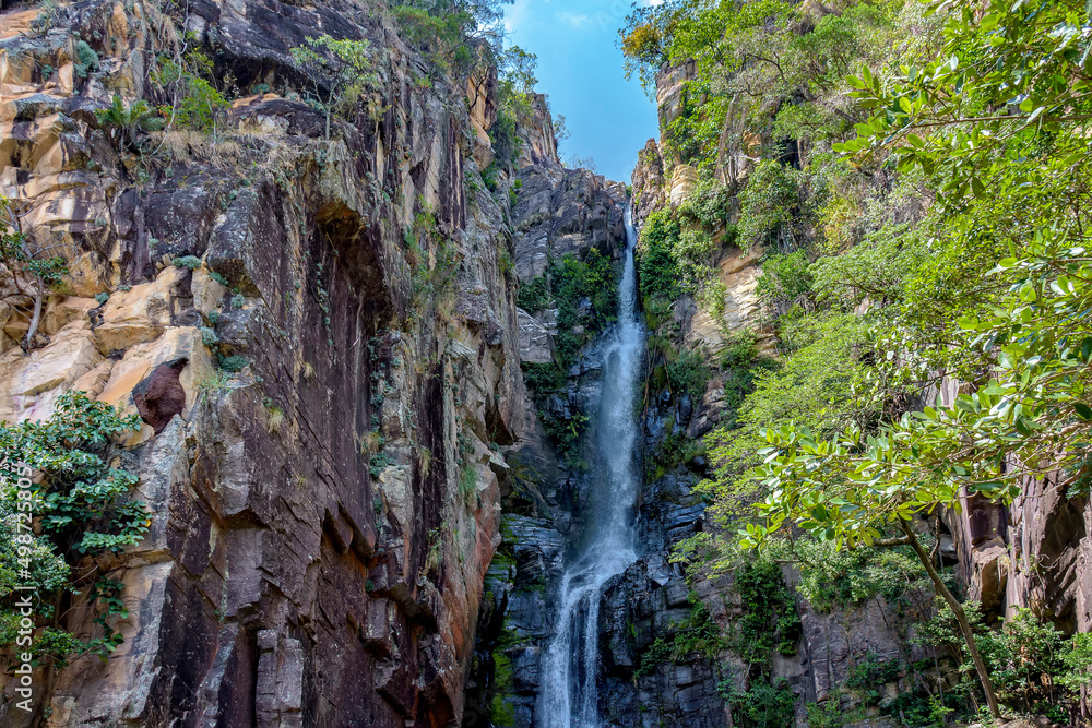 Beautiful waterfall among the rocks on a mountainside in the Serra do Cipo region of the Brazilian Cerrado (savanna) biome in Minas Gerais