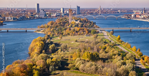 Panoramic view over the Riga city, Latvia, Island bridge, and Zakusala during sunny day