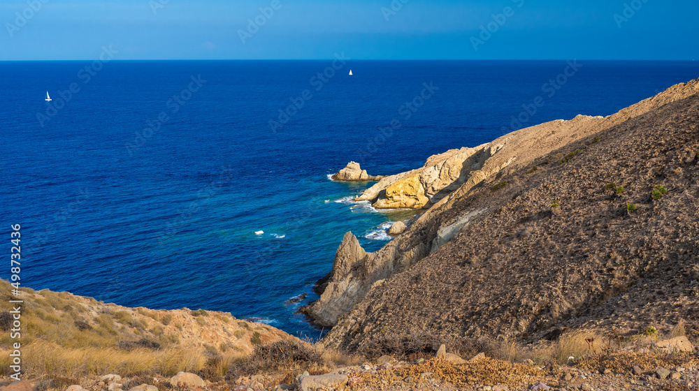 Rocky Coastline and Cliffs, Los Escullos, Cabo de Gata-Níjar Natural Park, UNESCO Biosphere Reserve, Hot Desert Climate Region, Almería, Andalucía, Spain, Europe