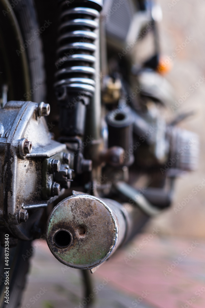 close up of retro bike, vintage motorcycle, exhaust system