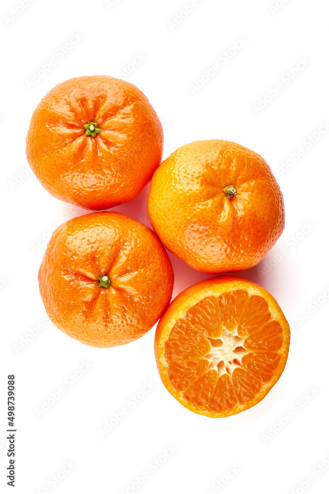 Juicy Tangerines, close-up, isolated on a white background. Juicy Tangerines, close-up, isolated on a white background.